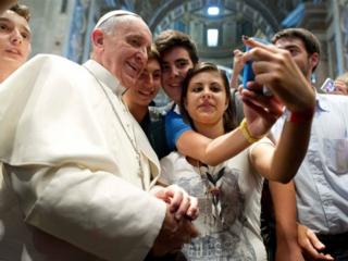 Pope Francis and selfies.