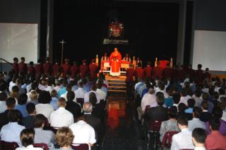 Blessing of the maroon and White at the Opening Day Mass. Courtesy of St. Paul's High School.