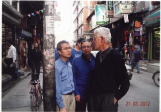 Bill Robins, SJ with a group form the Toronto based Eyrie Foundation for Children who support a school in the Jhapa District.