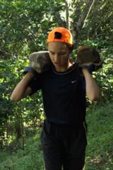 Mark Proven carrying rocks. Source: Larry Franz