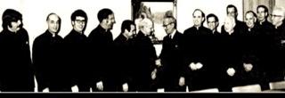 Founding of COC t the offices of UN Secretary General, U Thant on May 4, 1971. Shaking hands with U Thant is co-founder Pedro Arrupe, SJ, to the right of U Thant is Bishop (later Cardinal) Joseph Bernardin. Source: Jesuit Forum for Social Faith and Justice.